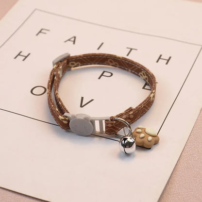 Adjustable Colorful Pet Collar with Bell and Cartoon Footprint Design for Dogs and Kittens