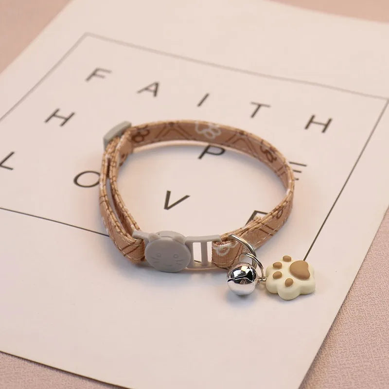 Adjustable Colorful Pet Collar with Bell and Cartoon Footprint Design for Dogs and Kittens